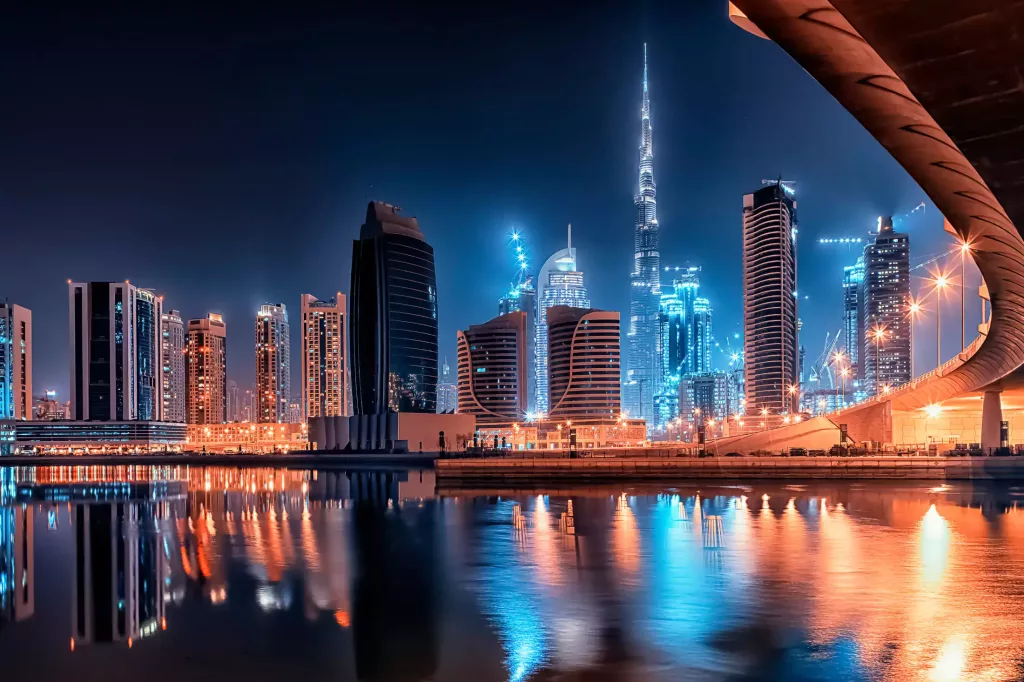The cityscape of Dubai at night.